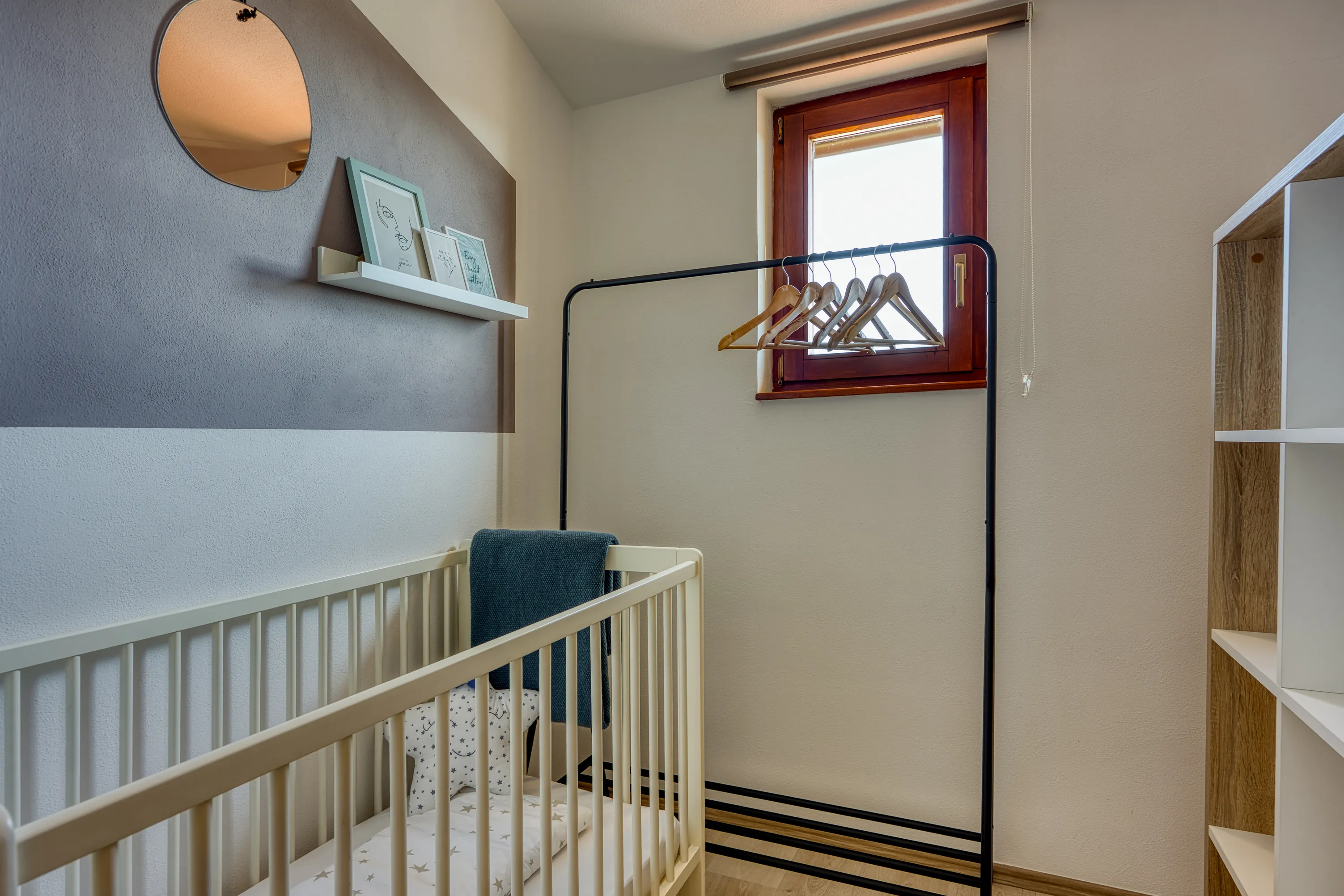 Baby cot prepared for a family stay